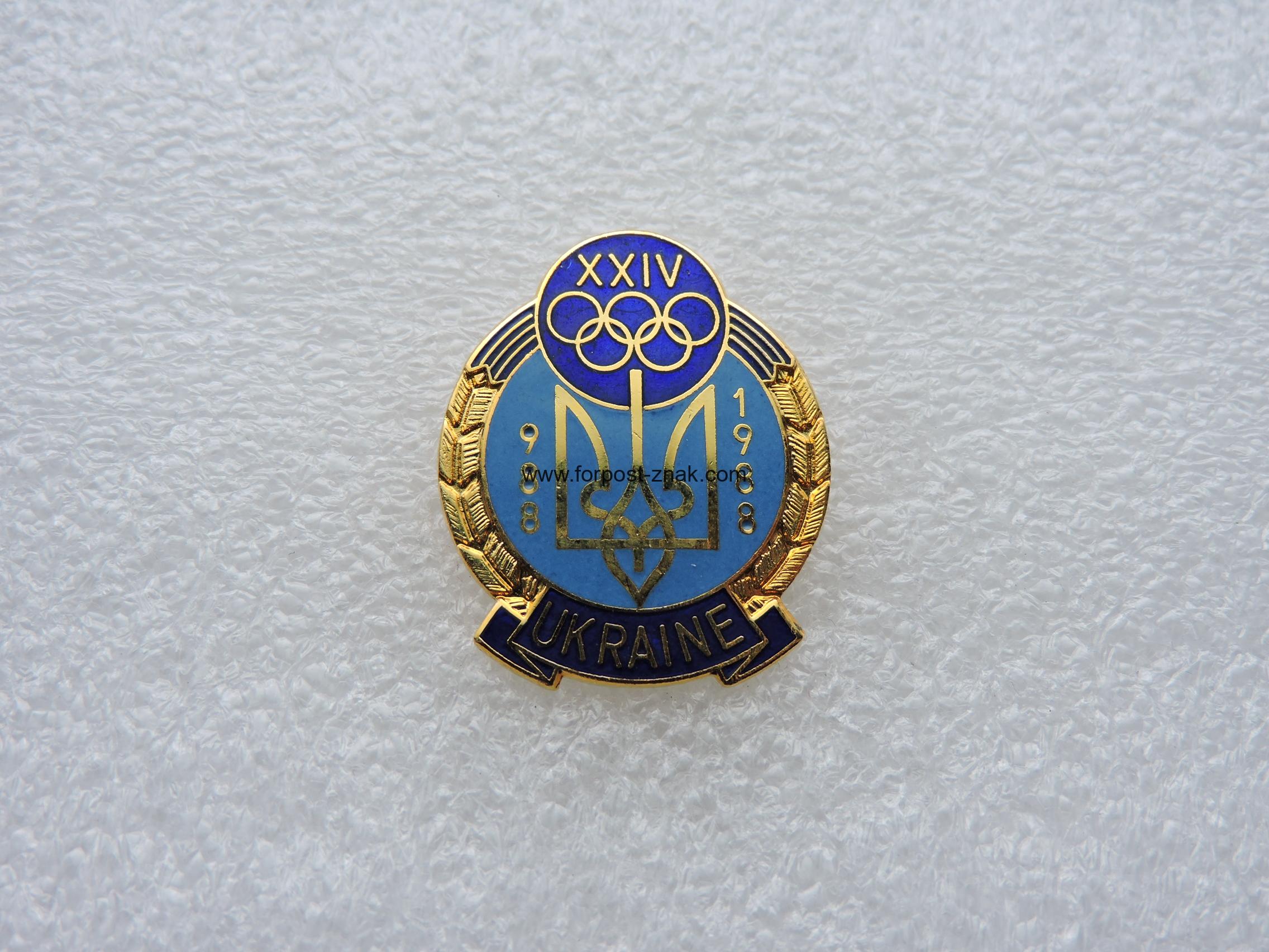 Знак учасника Олімпіади присвяченний 1000 -тю Хрещення Украіни .